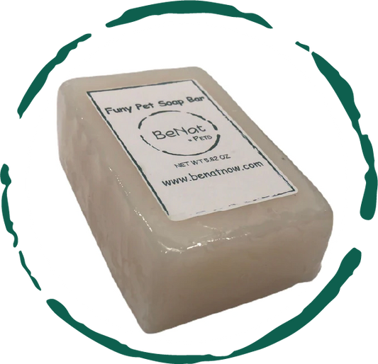 Beige pet soap bar with a label on a white background