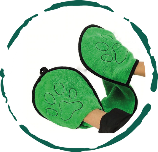 Green paw-shaped mittens with black accents on a white background