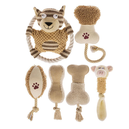 Set of pet toys including a lion-shaped rattle, a textured ball, and other chew toys on a white background.